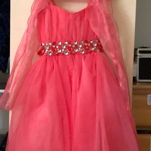 A pink dress size 6  also comes with shoulder wrap
